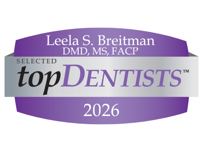 Top Dentists 2026 badge for Leela S. Breitman, DMD, MS, FACP, on a purple and silver background.